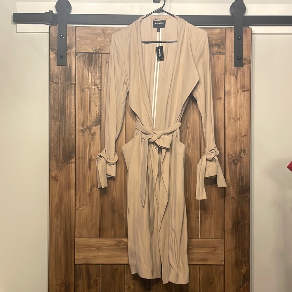 Khaki trench coat. Never worn. Tags on